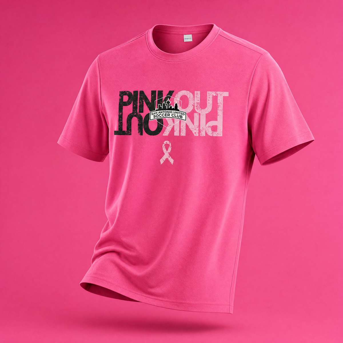 Hot pink SA United 2026 Pink Out Tee with soccer club and awareness ribbon graphic, front view
