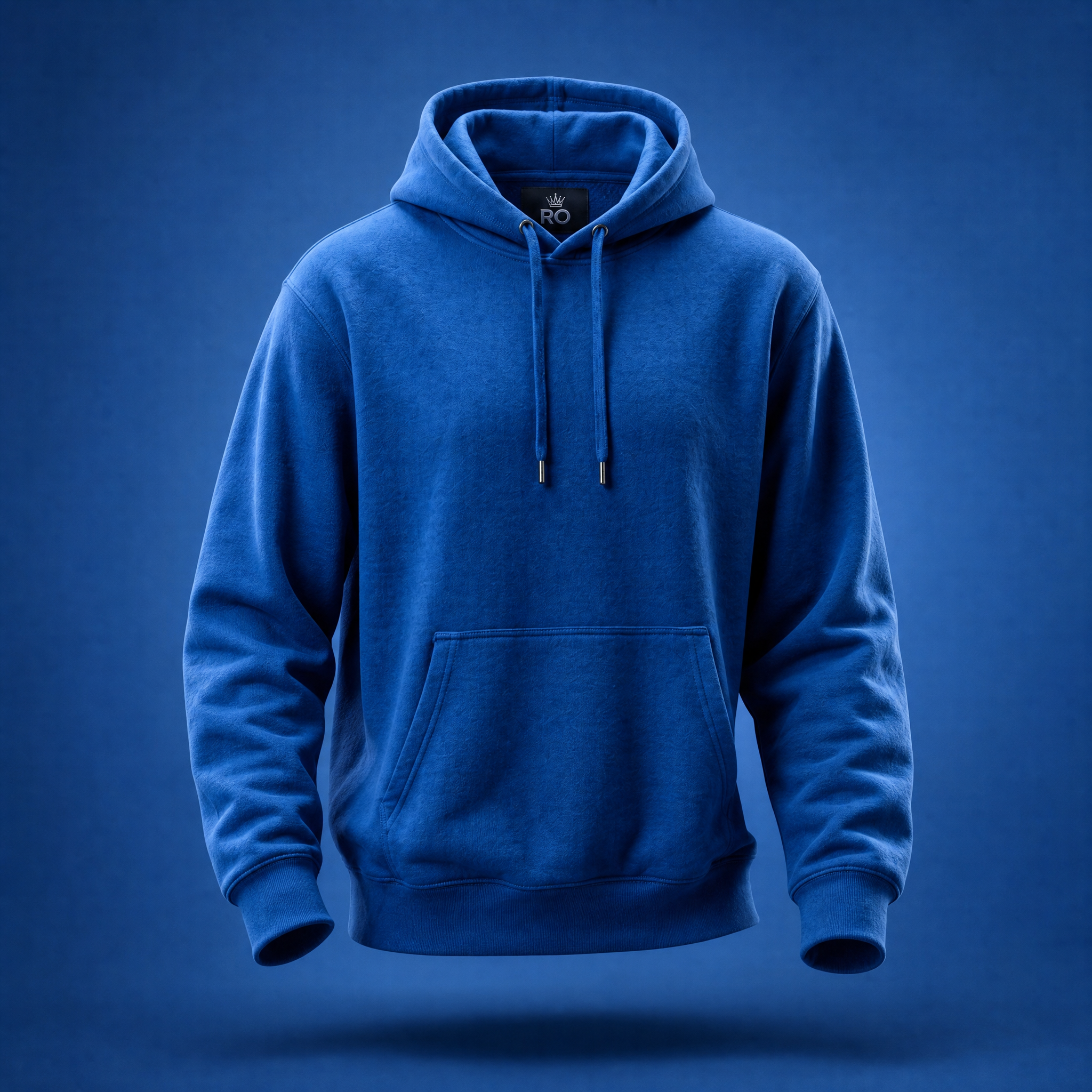 A royal blue pullover hoodie with drawstrings and a front kangaroo pocket, shown floating against a matching blue gradient background.