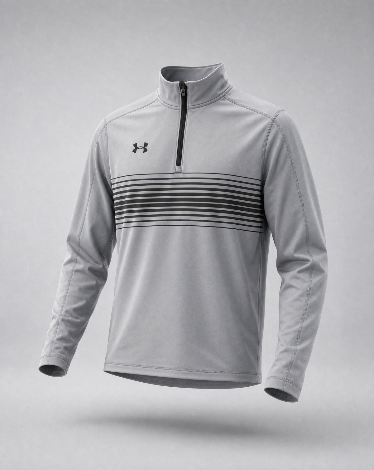 Light gray UA Men's Qualifier Novelty quarter-zip with black chest stripes, front view
